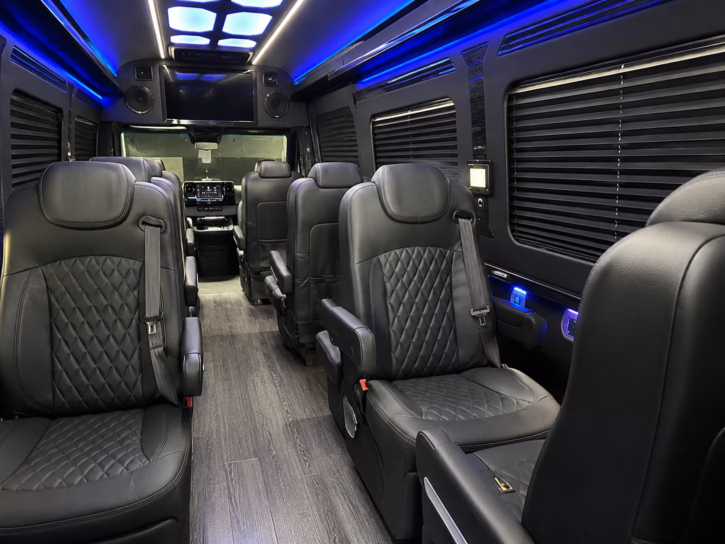 carrollton sprinter van with driver inside